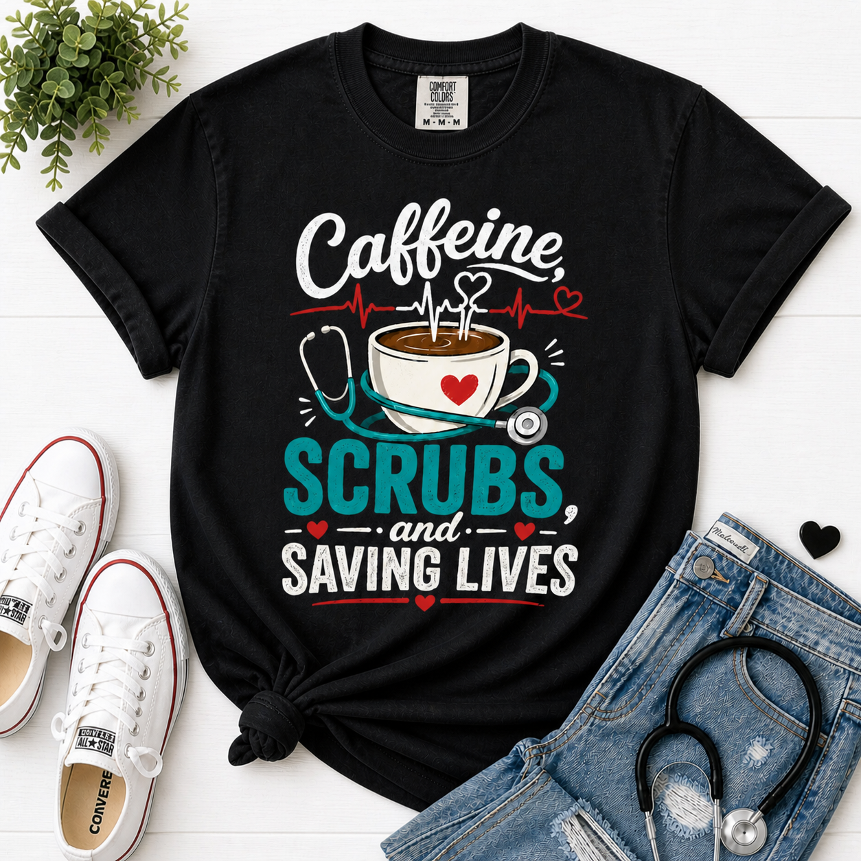 Caffeine Scrubs and Saving Lives nurse t-shirt in Black - Comfort Colors flatlay